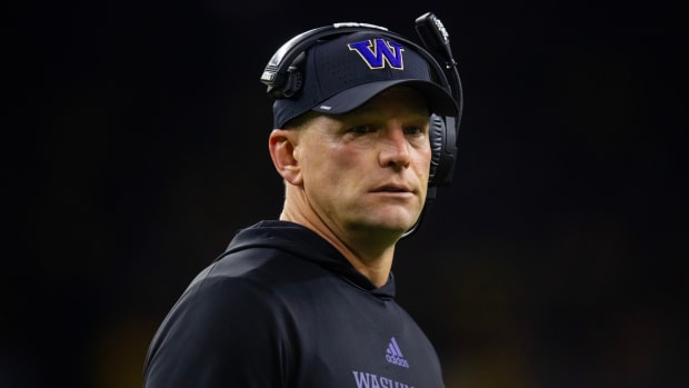 Washington Huskies head football coach Kalen DeBoer looks on during the national championship game against Michigan.